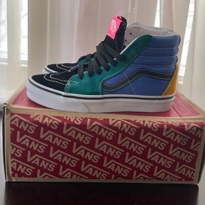 Color block high top vans.